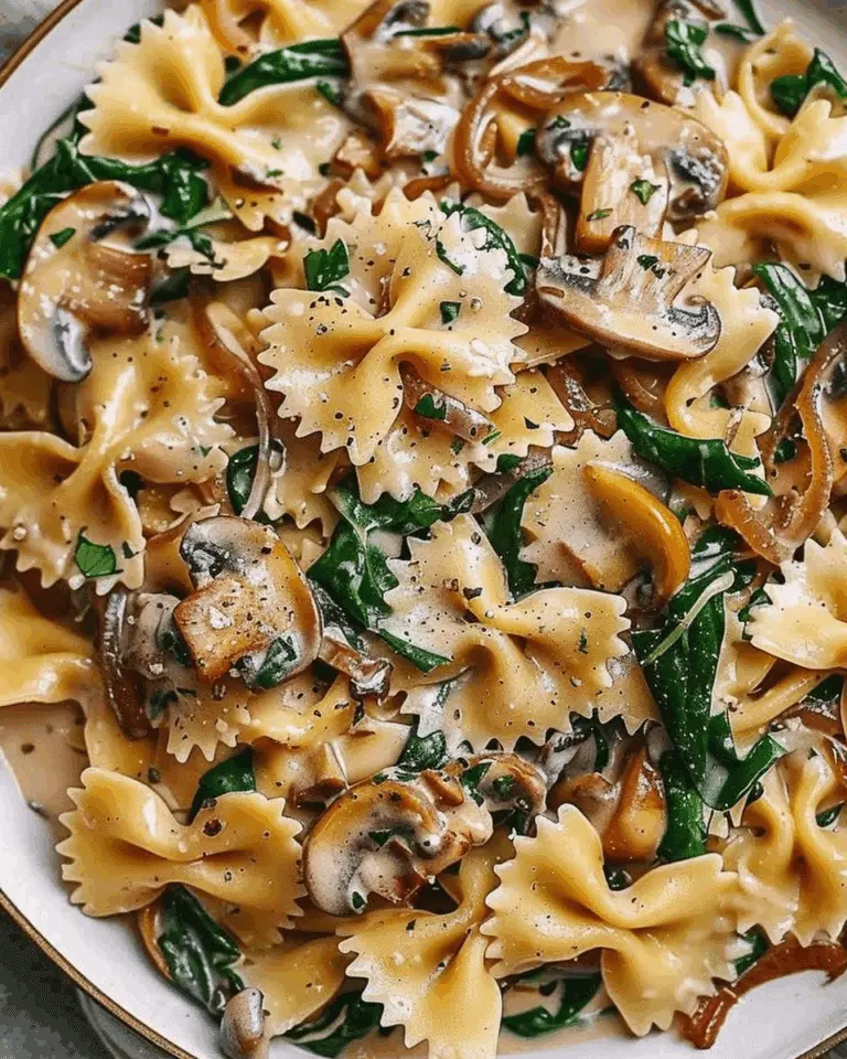Creamy Farfalle Pasta with Spinach, Mushrooms, and Caramelized Onions